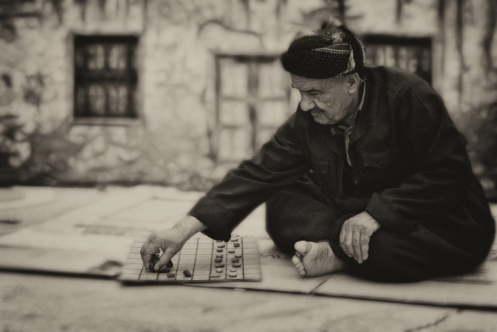 man playing checkers