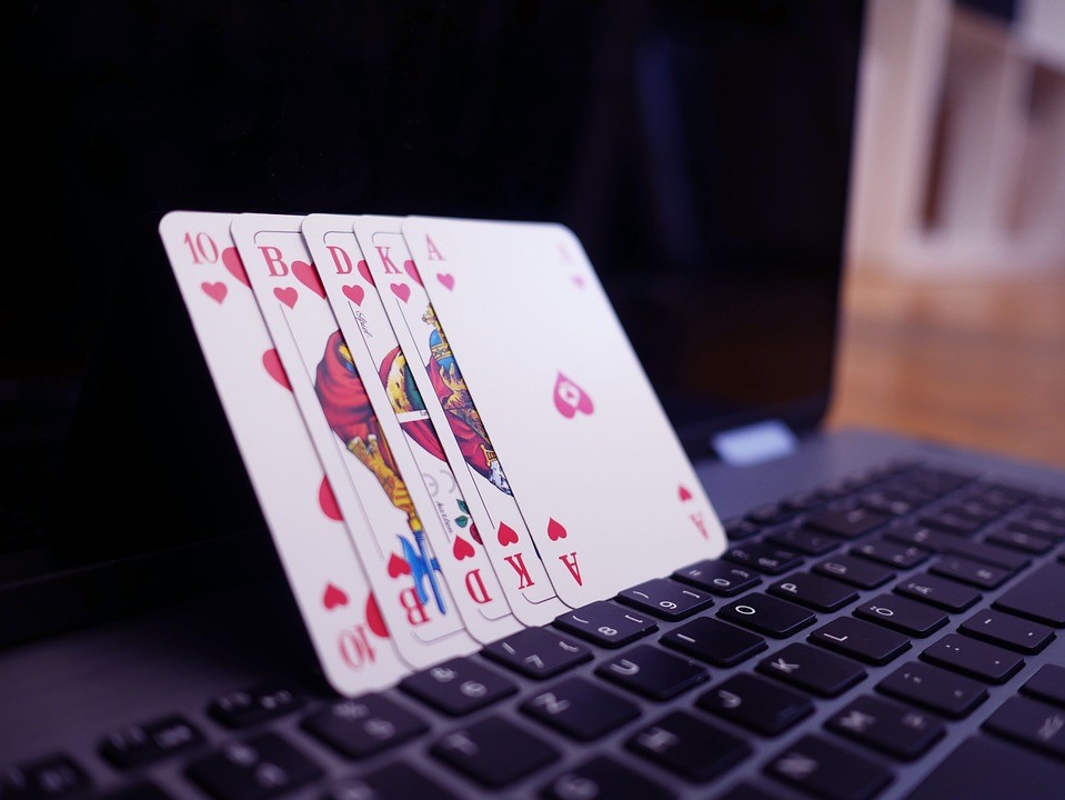 Cards resting on a laptop keyboard