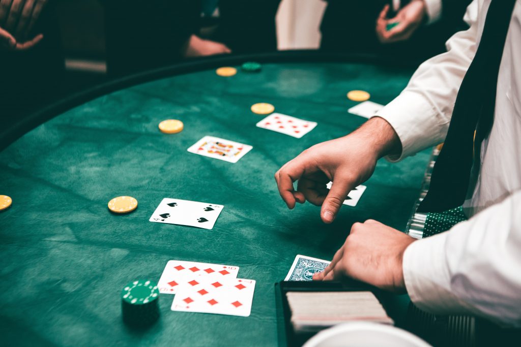 a dealer dealing blackjack at a casino